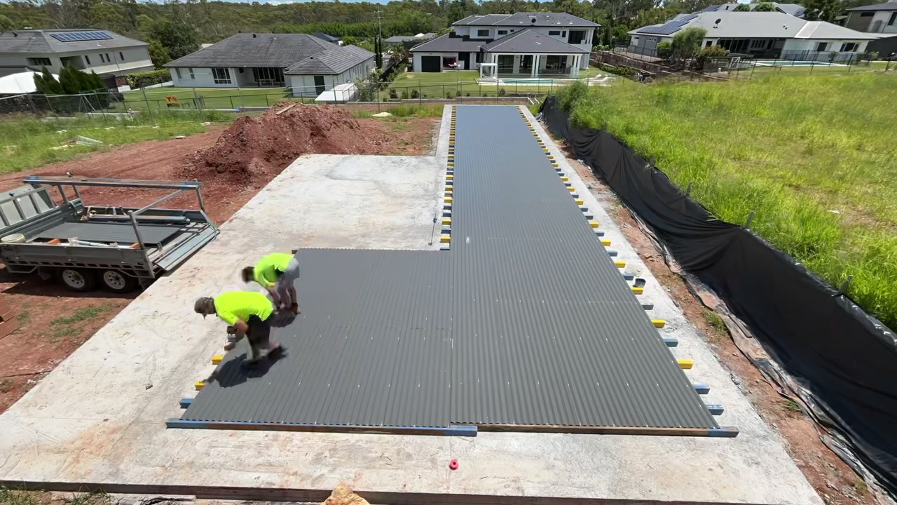 Concrete pool covered with a custom pool platform after