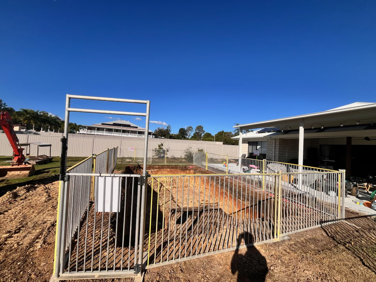 Temporary fencing installed at a residential construction site