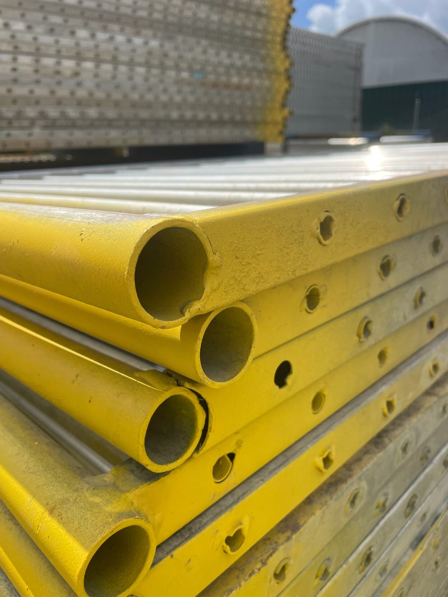 Bright yellow temporary pool fencing