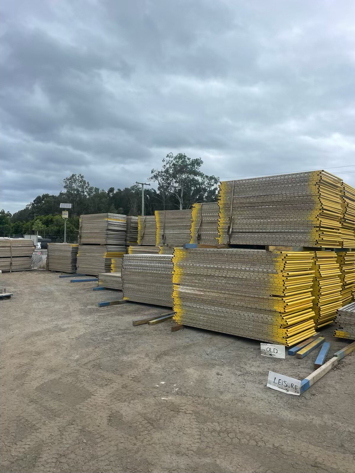 Bright yellow temporary pool fencing